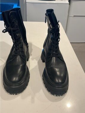Stuart Weitzman Black Leather Lug-Sole Combat Boots